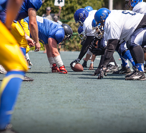 Football game players in formation